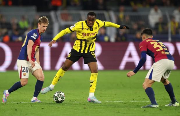 "独家揭秘：阿森纳密会吉滕斯经纪人，英超多强争霸焦点球员争夺战"